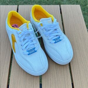 Skechers White Sneakers with Yellow Highlights
